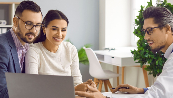 A couple talking to a the Woodlands IVF specialist
